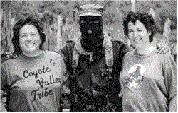 Priscilla Hunter and Pauline Girvin meeting with a major in the Zapatista army in Chiapas, Mexico in 1994.